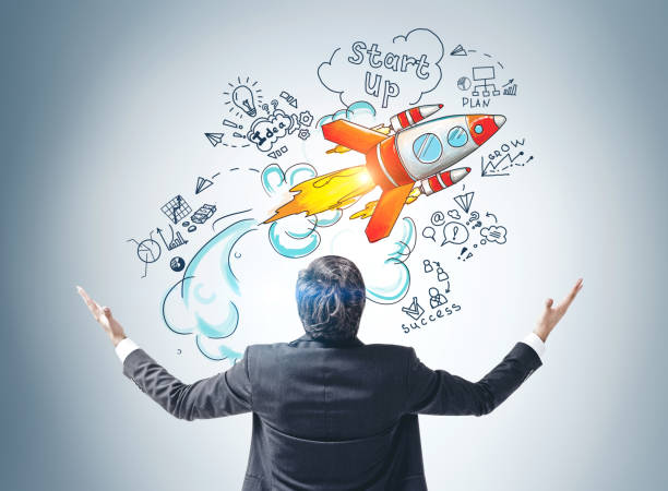 istock Happy young businessman and his start up project 1196691897