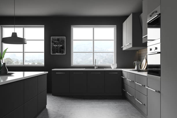 istock Side view of dark grey kitchen with picture 1196695429