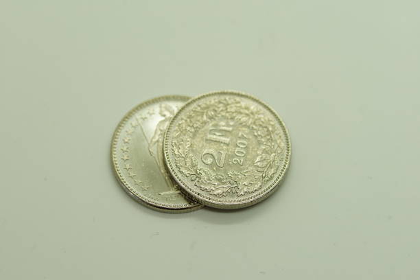 istock Two Swiss Franc isolated on white background. 2 Franc 1196695760