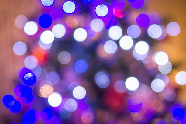 istock White and purple bokeh. Blur abstract background and texture. 1196700516