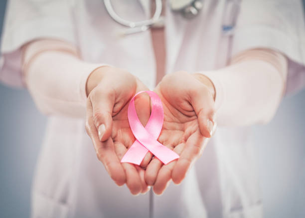 Pink ribbon concept. National cancer survivor day. stock photo