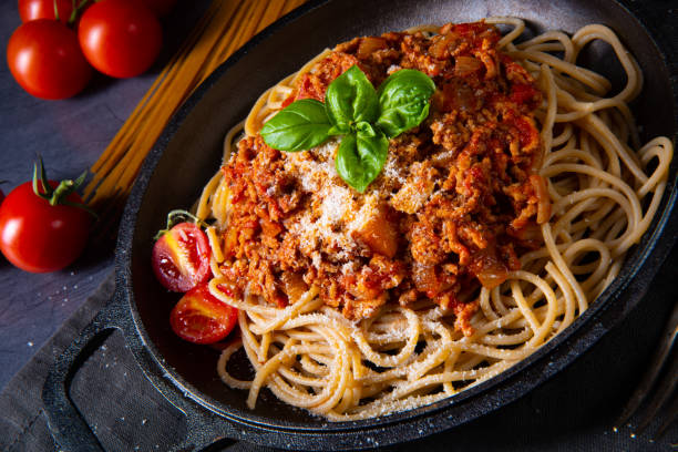 istock wholegrain spaghetti with tomato sauce and minced meat 1196702540