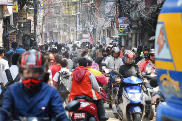 Typical bustling crowded street scene in downtown Kathmandu, capital of Nepal