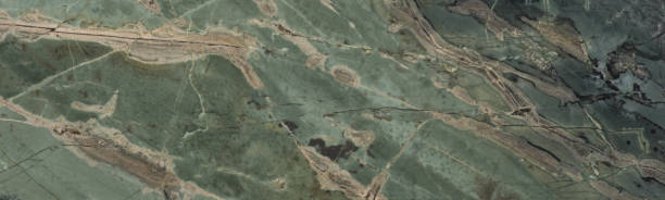 istock malachite, natural green stone background with abstract pattern 1196706667
