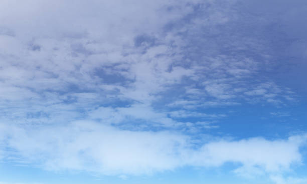 istock Background of blue sky and white clouds 1196708141