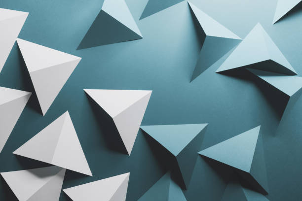 istock Abstract pattern made of colored paper, blue background 1196708912
