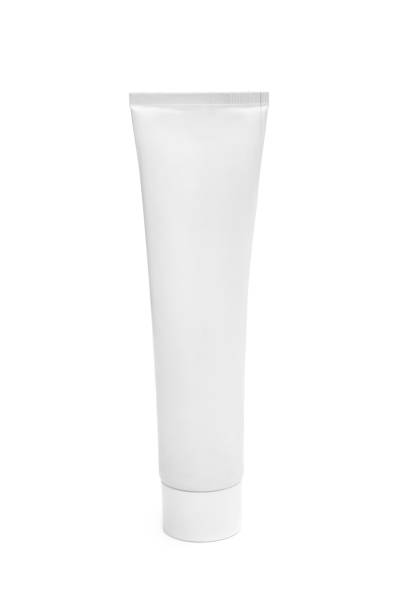 istock White blank tube of toothpaste on white. 1196715063