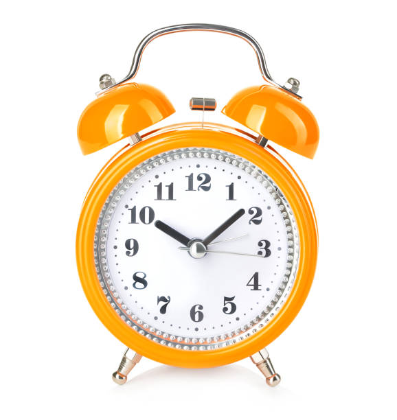 istock Retro alarm clock close-up isolated on white background. 1196717028
