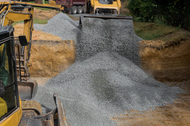 istock Loading of stone excavator works in gravel pit 1196717991