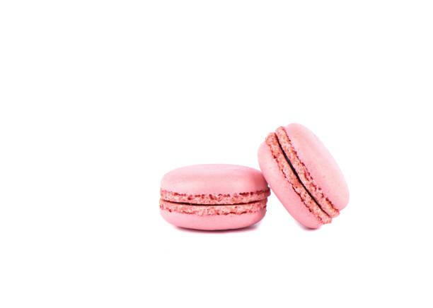 istock Two pink macaroon isolated on a white background. 1196721270