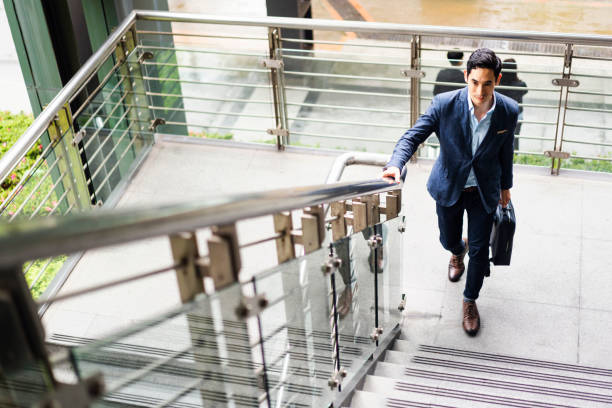 istock Moving up on corporate ladder 1196725856