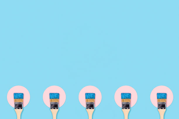 istock Blue background with paint brushes and circles. 1196730388