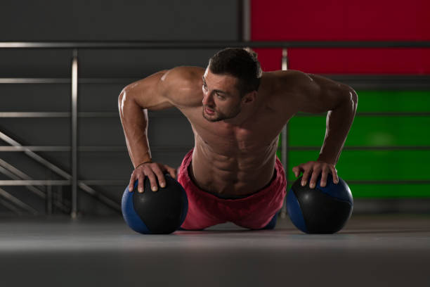 istock Push Ups With Medicine Ball 1196730497