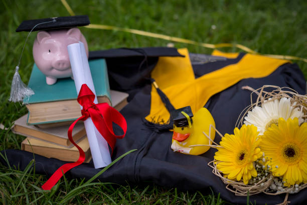 istock Black graduation gowns 1196734094