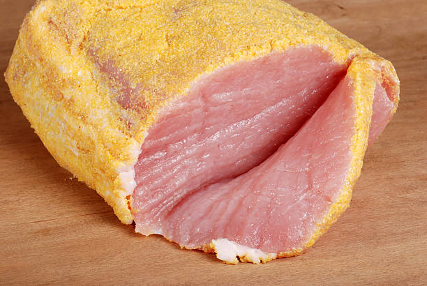 sliced canadian peameal bacon  uncooked bacon stock pictures, royalty-free photos & images