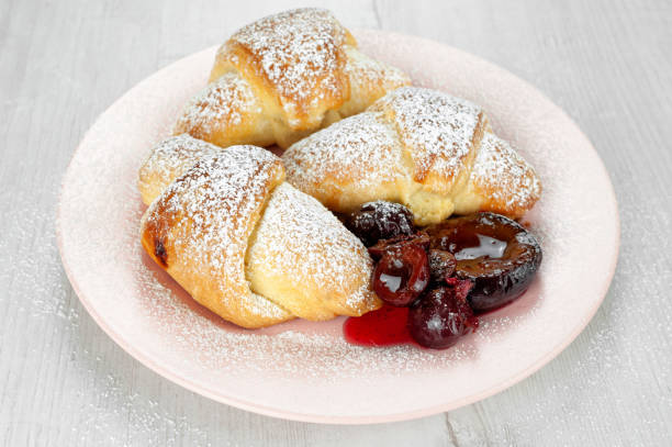 istock Plum cake and fruits on the table 1196735249
