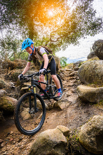 istock Teenager MTB In The Rocks 1196736476
