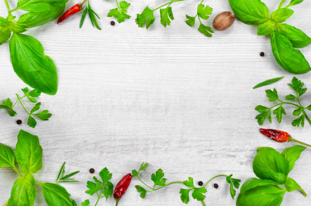 istock Fresh spices on wooden background top view 1196736508