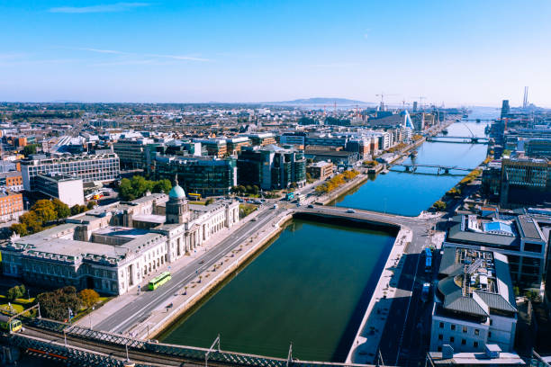 Dublin aerial view with Liffey river and Custom House Dublin aerial view with Liffey river and O'Connell bridge dublin republic of ireland photos stock pictures, royalty-free photos & images