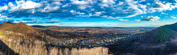 istock Clouds in the blue sky over the Carpathian city 1196737499