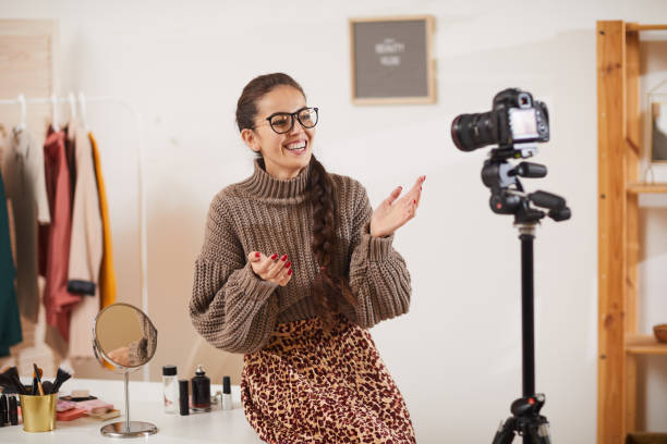 Smiling Young Woman Talking to Camera in Beauty Studio