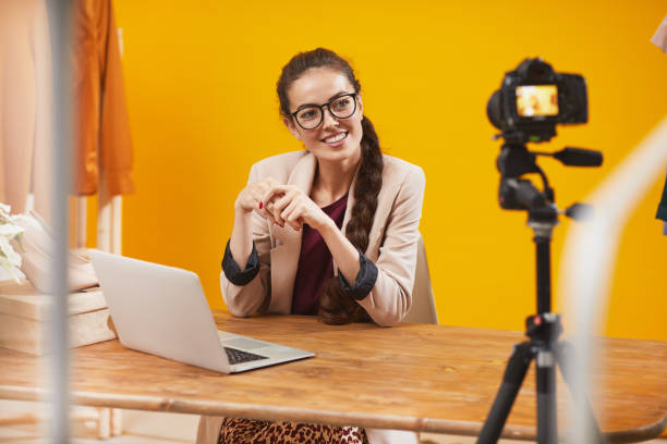 istock Beauty Vlogger Talking to Camera 1196741134