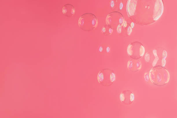 istock Abstract beautiful trendy pink background with soap bubbles. Backdrop for your design. Copy space. 1196743929