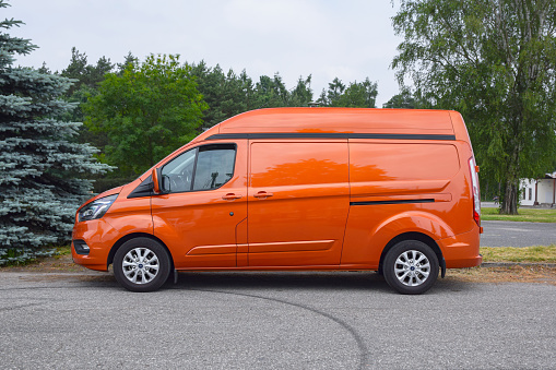 Berlin, Germany - 11 June, 2018: Ford Transit Custom parked on a street. This model is one of the most popular vans in Europe.