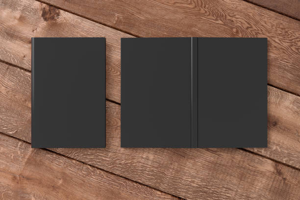 istock Blank black vertical closed and open and upside down book cover 1196749906