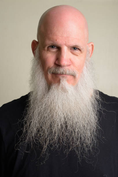 istock Face of mature bald man with long gray beard 1196751996