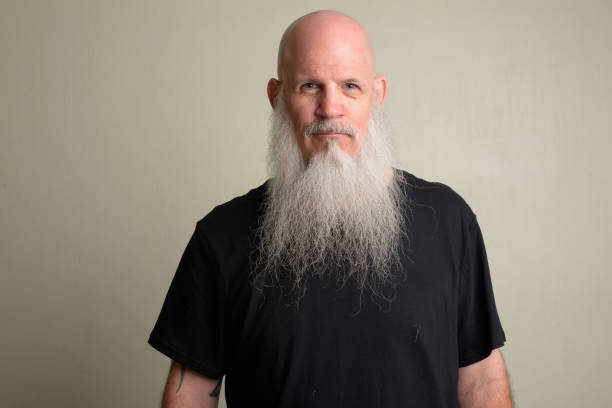istock Mature bald man with long gray beard 1196752015