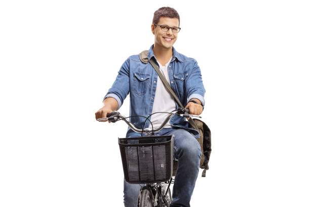 istock Young casual man riding a bicycle 1196754174