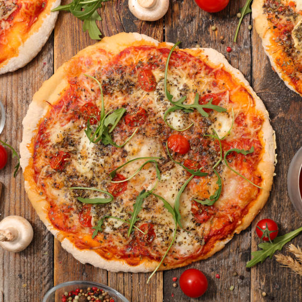 istock pizza with tomato sauce, mushroom and cheese 1196754243
