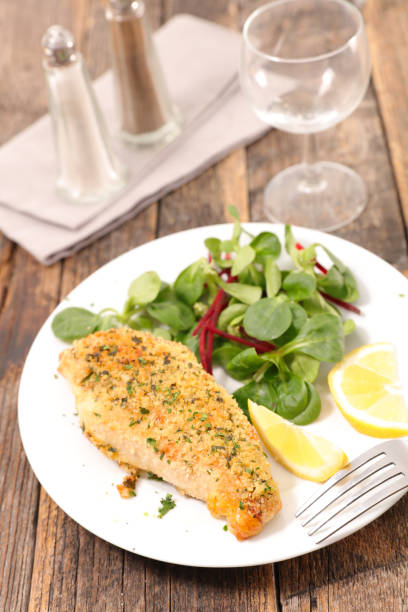 istock fried chicken fillet and salad 1196754280