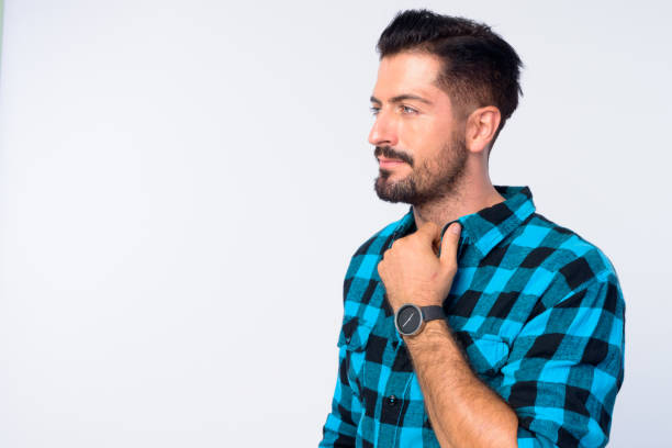 istock Face of young handsome bearded hipster man 1196755453