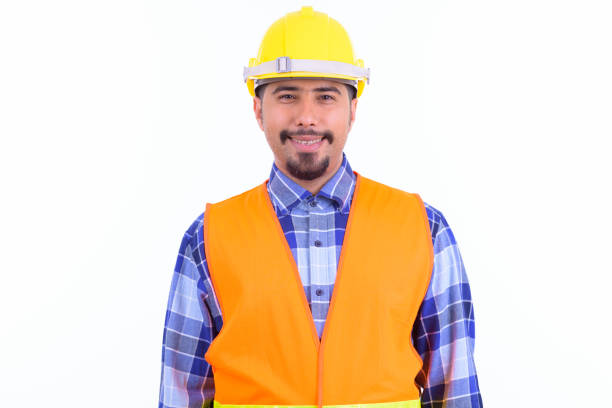 istock Happy bearded Persian man construction worker smiling 1196756697