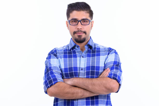 istock Handsome bearded Persian hipster man with arms crossed 1196756773