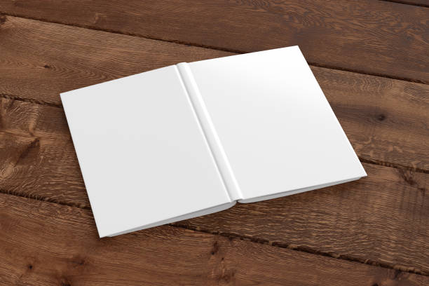 istock Blank white vertical open and upside down book cover 1196756897
