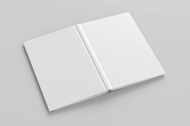 istock Blank white vertical open and upside down book cover on wooden background 1196756923