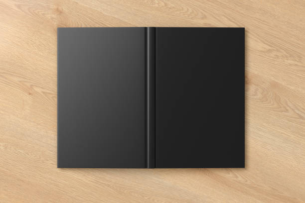 istock Blank black vertical open and upside down book cover 1196757377