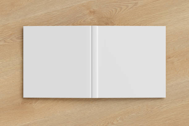 istock Blank white square open and upside down book cover 1196758133