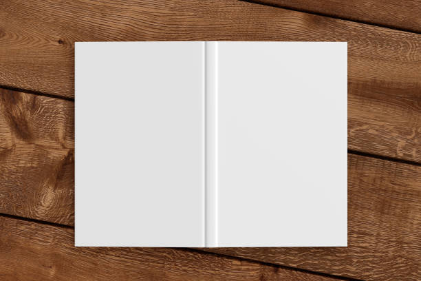 istock Blank white vertical open and upside down book cover 1196758223