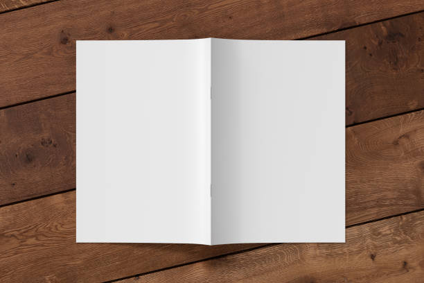 istock Brochure or booklet cover mock up. Brochure is open and upside down. 1196758476