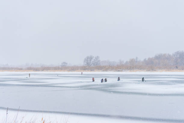 istock Fishermen on the Oka River at winter 1196768193