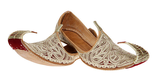 Traditional Arabic shoes over white stock photo