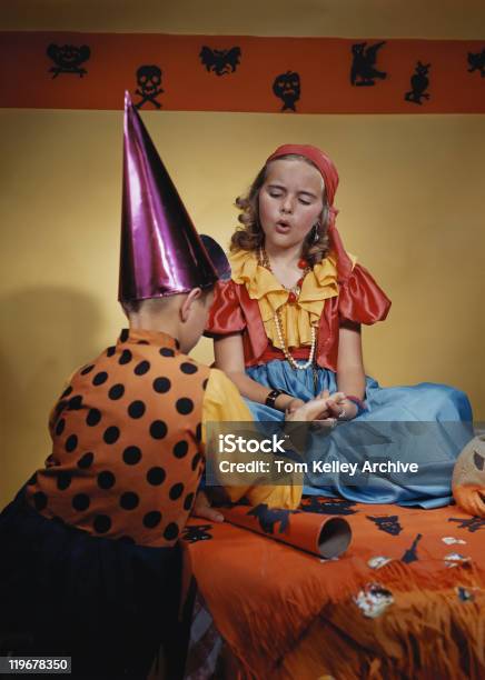 Girl Reading Palm Stock Photo - Download Image Now - Halloween, 1950, Archival