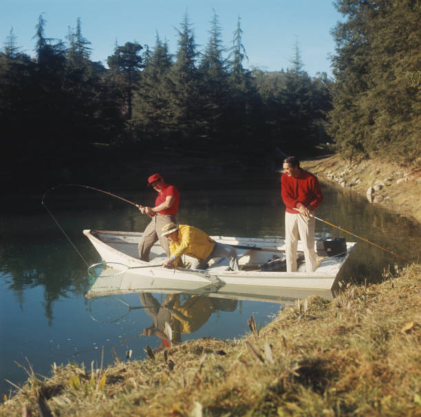 Men fishing in lake  1968 stock pictures, royalty-free photos & images