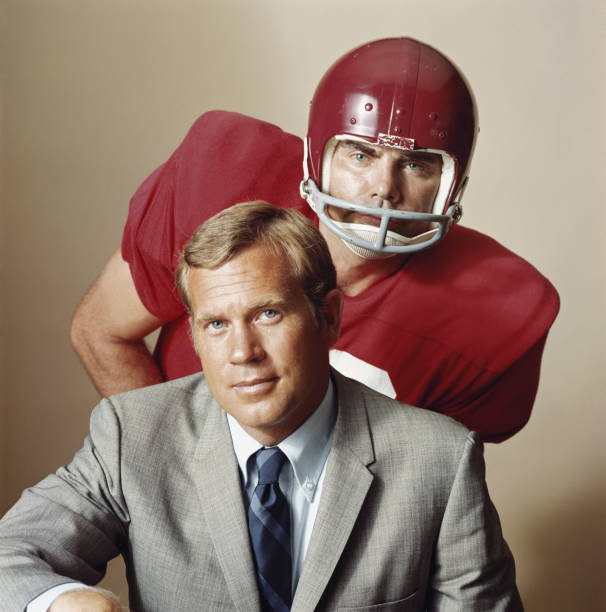 Coach with American football player, portrait  archival stock pictures, royalty-free photos & images