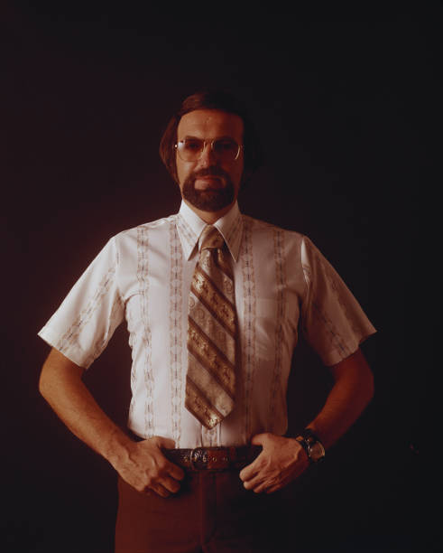 Man standing against black background, close-up  1971 stock pictures, royalty-free photos & images