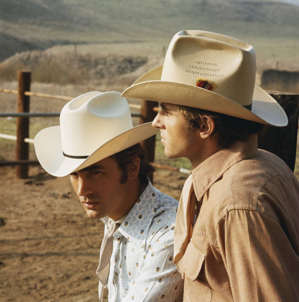 Young cowboys standing in ranch, close-up  1971 stock pictures, royalty-free photos & images